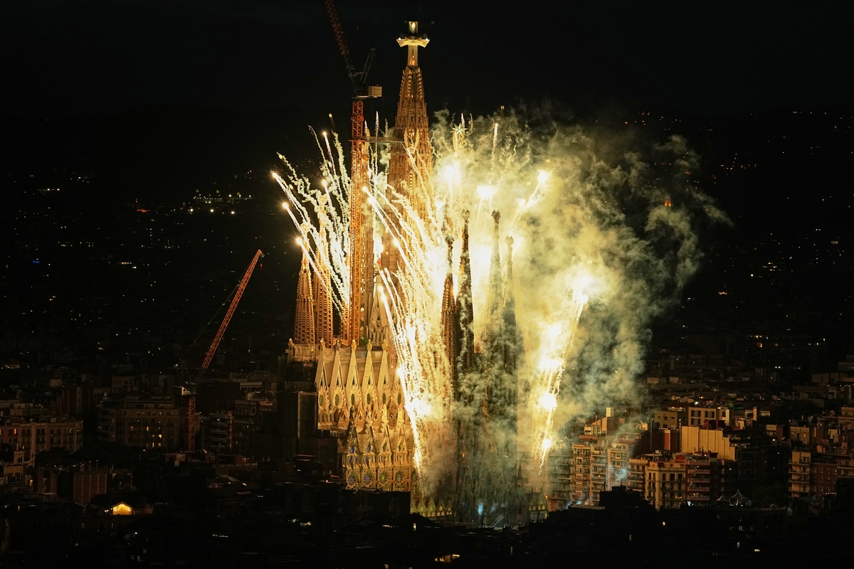 Fireworks engulf Antoni Gaudí's Basilica of the Sagrada Família, seen from Torre Glòries, after Pope Leo XIV blessed the newly completed central Tower of Jesus Christ in Barcelona, Spain, Wednesday, June 10, 2026. The tower's completion made the Sagrada Família, at 172.5 meters (566 feet), the tallest church in the world. (AP Photo/Fatima Shbair)